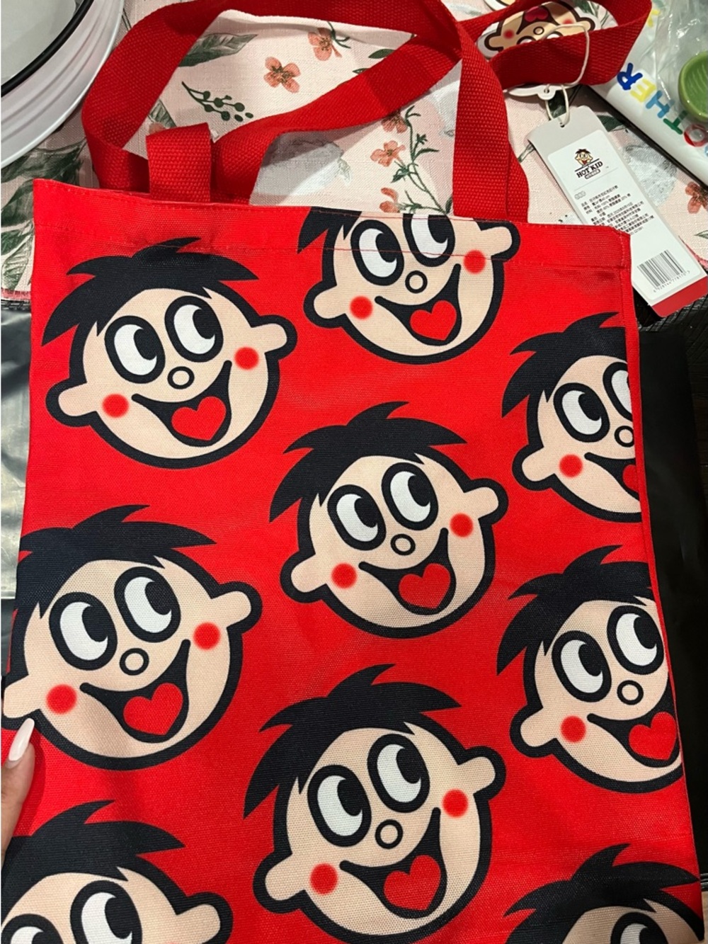 Red Graphic Tote Bag with Playful Face Print